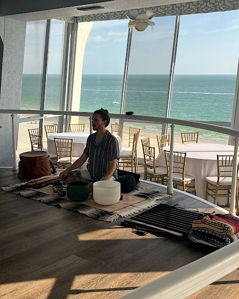 Sound bathing class in gulf vista at The Bellwether Beach Resort.