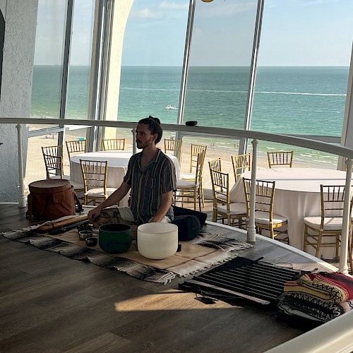 Sound bathing class in gulf vista at The Bellwether Beach Resort.