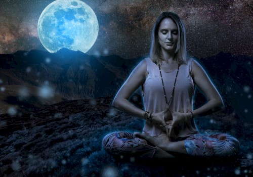 Illustration of woman in yoga pose with a full moon rising in the background.