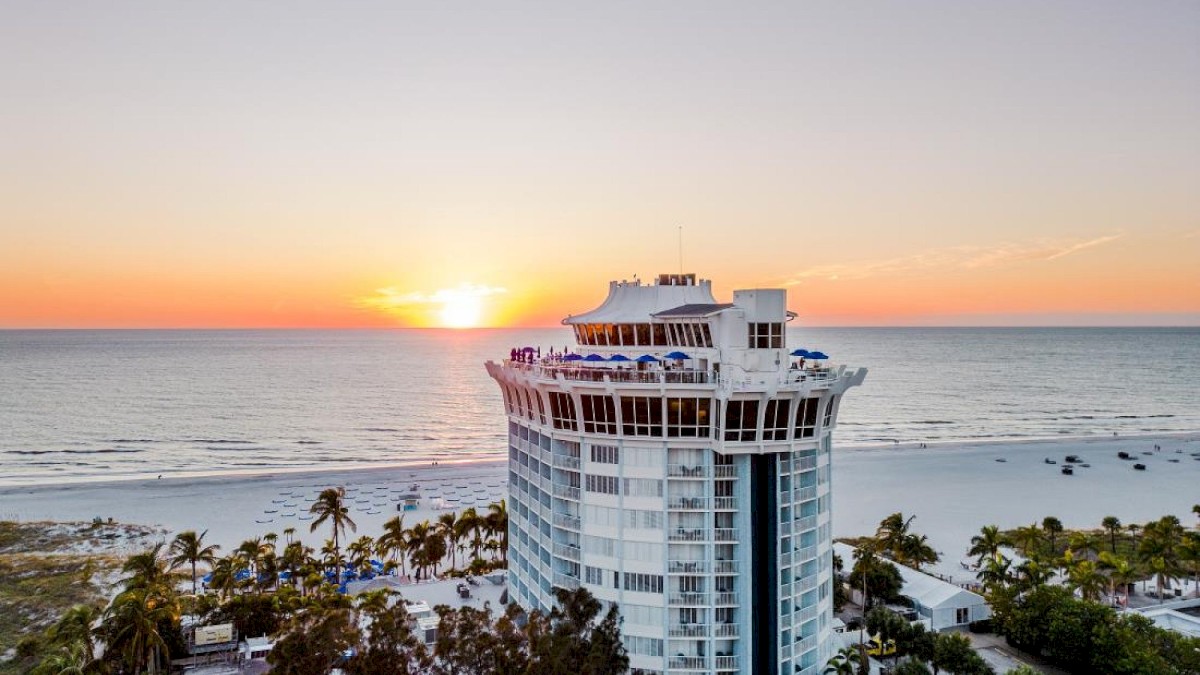 Sky view of Bellwether Beach Resort at sunset.