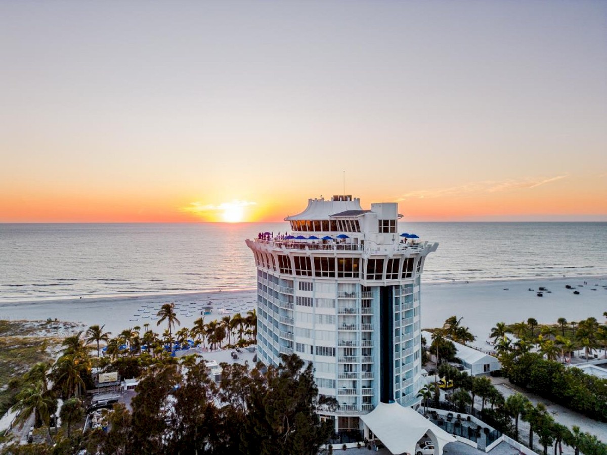 Sky view of Bellwether Beach Resort at sunset.